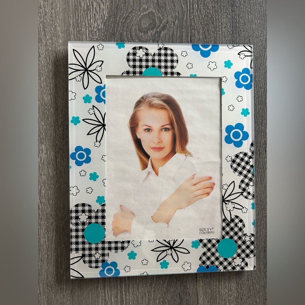 Two 5x7 glass picture frames